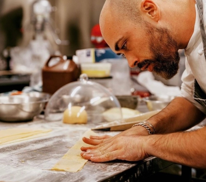 "Chef Alessandro Iovine cooking three types of fresh pasta"
